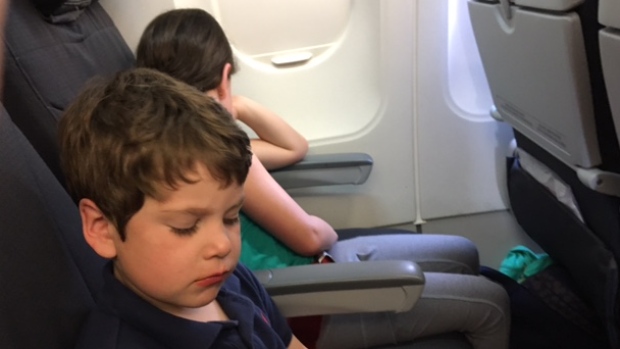 Father, Steve Moore took this photo of children Callum and Maddy shortly before they were removed from their Air Canada flight.